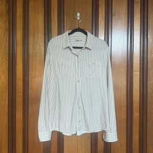 This is a Faherty Legend sweater shirt in a tannin stripe pattern.